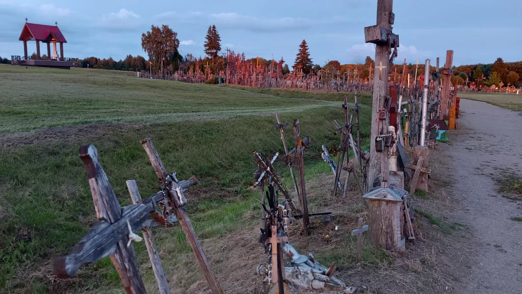 The Hill of Crosses became famous around the world when Pope John Paul II visited it on September 7, 1993. In the chapel (architects A. Jukna and R. Budrytė) built opposite the Hill of Crosses, John Paul II celebrated Holy Mass for a gathering of 100,000 pilgrims. The Pope blessed Lithuania and all Christian Europe. One year later, the gift of the Holy Father to Lithuania – the Crucifix (sculptor E. Manfrini) – reached the Hill of Crosses.